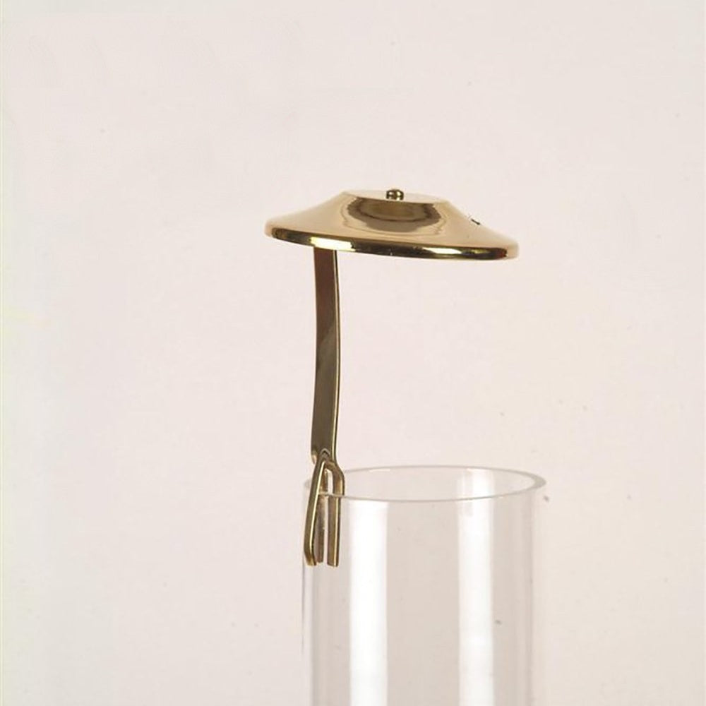 Brass clip-on smoke bell designed to reduce soot from oil lamp chimneys, featuring a simple curved arm and round top, ideal for lamps and lighting accessories.