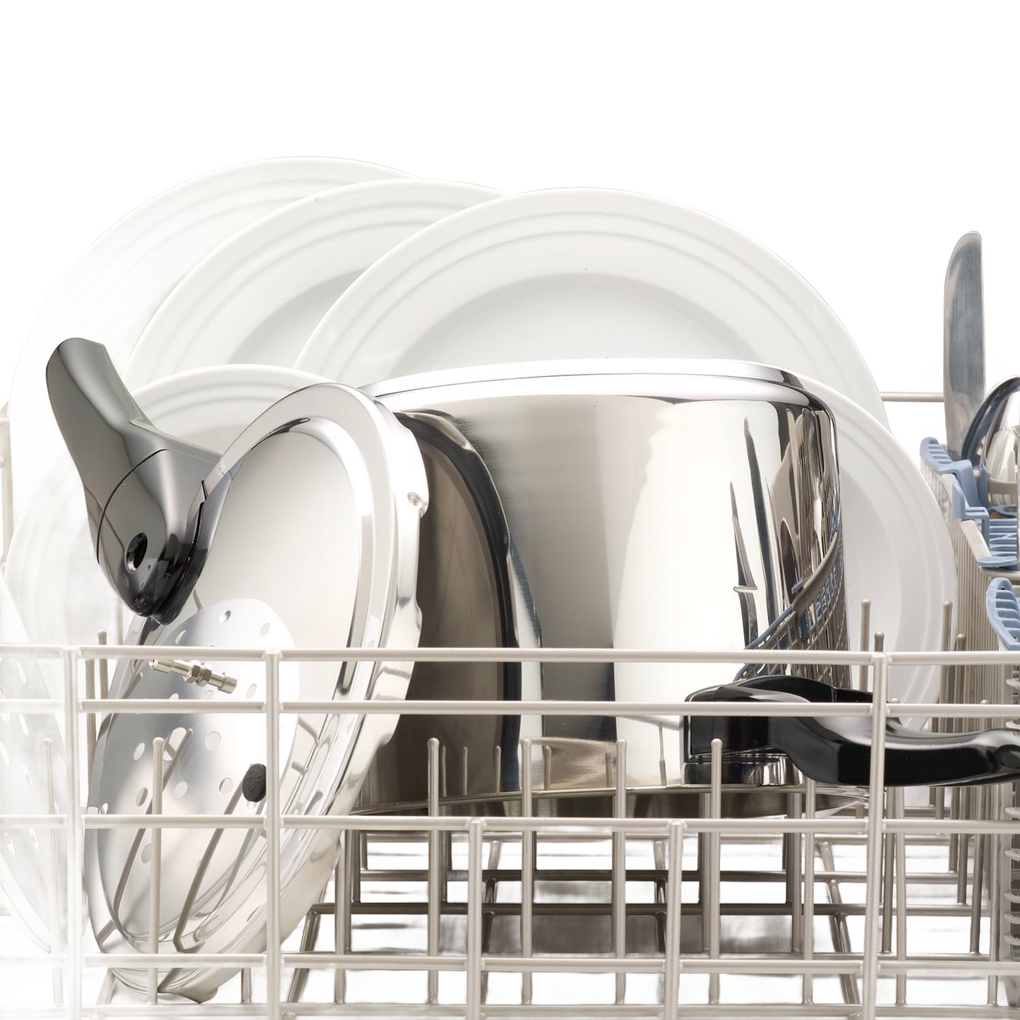 Polished stainless steel pressure cooker with lid inside a dishwasher rack alongside white plates, featured for Kitchen & Food, Cookware, Pots and Pans, Best Sellers, and Promo Eligible collections.