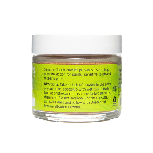 Clear jar of handcrafted tooth powder for sensitive teeth with label detailing soothing, numbing action and directions, featured in Health & Wellness and USA Made collections.
