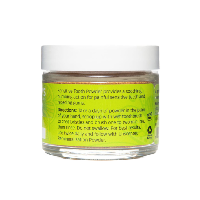 Clear jar of handcrafted tooth powder for sensitive teeth with label detailing soothing, numbing action and directions, featured in Health & Wellness and USA Made collections.