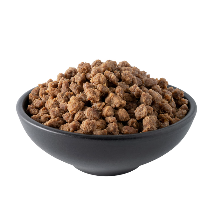 Black bowl filled with freeze-dried meat crumbles, ideal for emergency supplies, freeze dried food collections, and USA made preparedness meals.