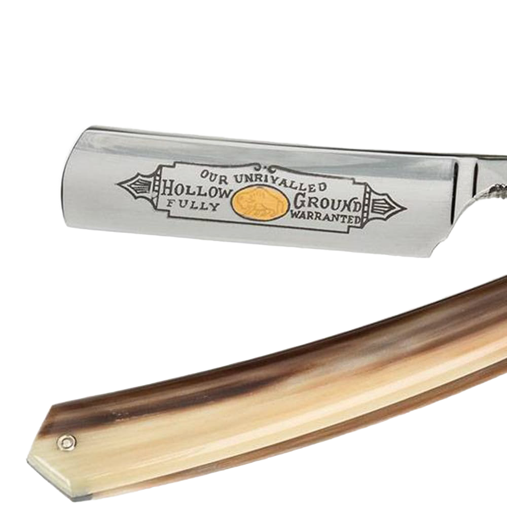 Close-up of a handcrafted straight razor featuring a polished hollow ground blade with intricate engraving and a smooth, natural-toned handle, suitable for Grooming and Personal Hygiene, Health & Wellness, Best Sellers, and Promo Eligible collections.
