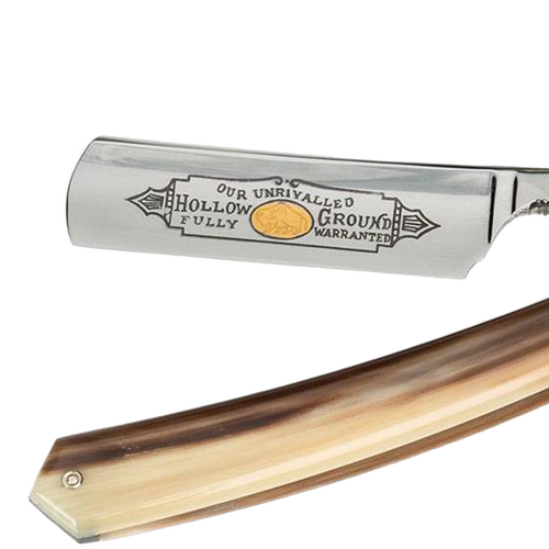 Close-up of a handcrafted straight razor featuring a polished hollow ground blade with intricate engraving and a smooth, natural-toned handle, suitable for Grooming and Personal Hygiene, Health & Wellness, Best Sellers, and Promo Eligible collections.