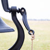 Black cast aluminum farm bell with sturdy mounting arm and twisted natural rope pull, handmade in the USA, perfect for Home & Decor and Farm, Garden & Tool collections.