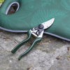 Heavy-duty left-handed bypass pruners with notched razor-sharp blade and ergonomic green handles, designed for precise shrub and rose trimming, featured in Farm, Garden & Tool and Best Sellers collections.