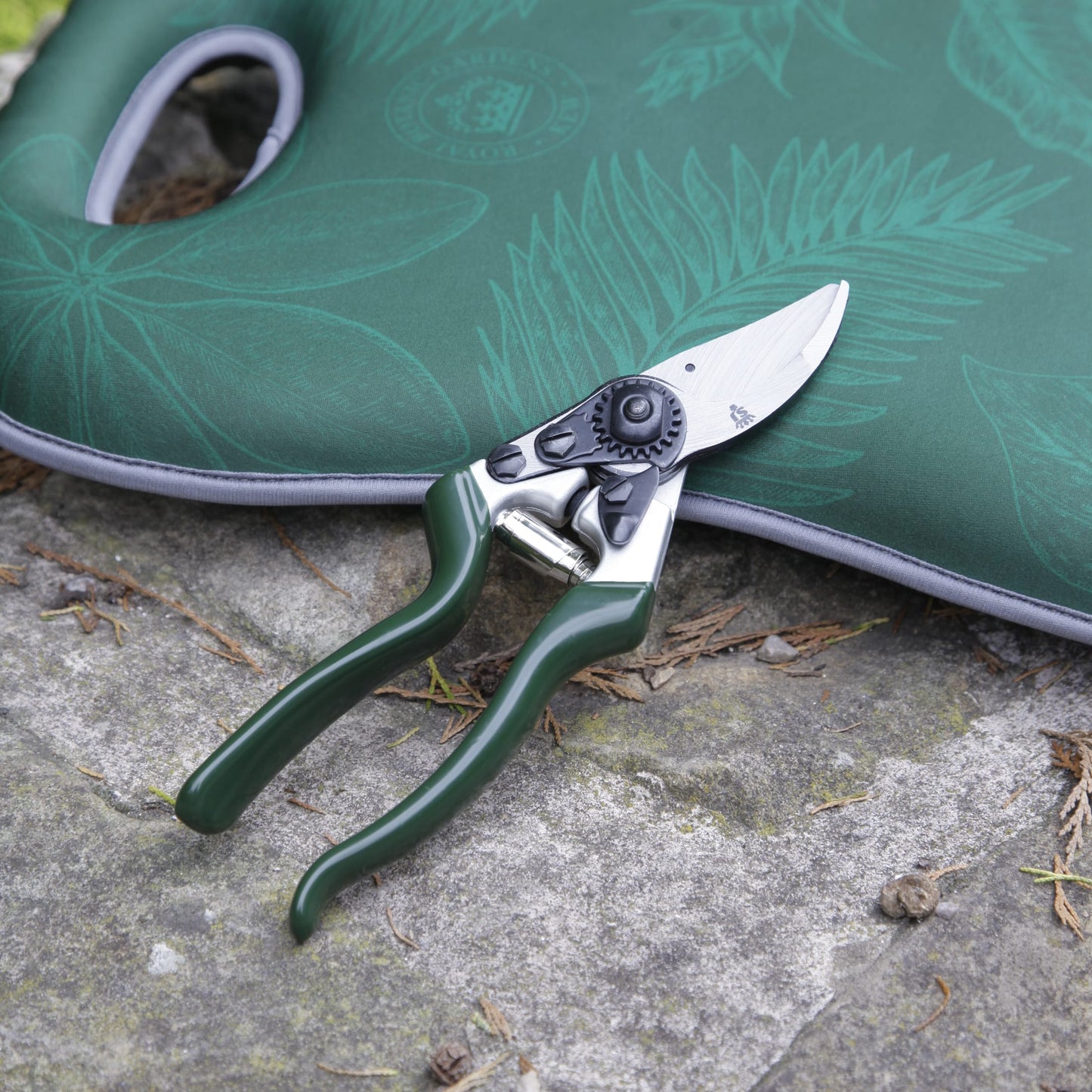 Heavy-duty left-handed bypass pruners with notched razor-sharp blade and ergonomic green handles, designed for precise shrub and rose trimming, featured in Farm, Garden & Tool and Best Sellers collections.