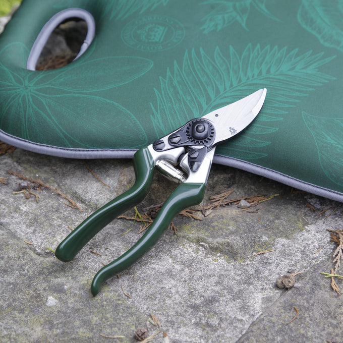 Heavy-duty left-handed bypass pruners with notched razor-sharp blade and ergonomic green handles, designed for precise shrub and rose trimming, featured in Farm, Garden & Tool and Best Sellers collections.