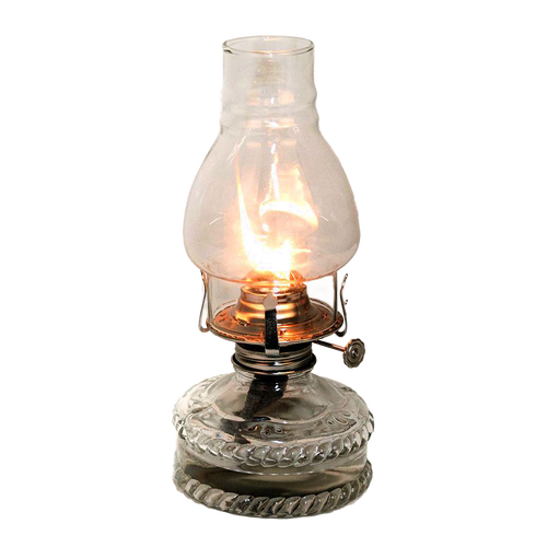 Handcrafted clear glass oil lamp with a lit flame inside a chimney, featuring a decorative base and metal burner, ideal for farm, garden, emergency lighting, and best-selling collections.