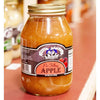 Glass jar of handcrafted apple pie filling made in USA, featuring natural fruit ingredients without corn syrup, displayed on a store shelf in kitchen and food collection.