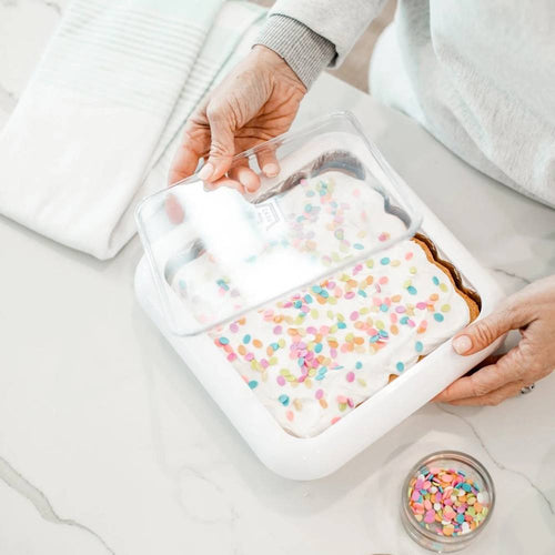 Handcrafted clear travel cover with removable window protecting an 8x8 foil pan filled with a decorated sheet cake, featured in Kitchen & Food, USA Made, and Kitchen Accessories collections.