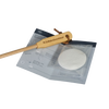 Back creamer and lotion applicator with a wooden curved handle and replaceable soft pads, designed for easy reach and application in Health & Wellness and Grooming collections.