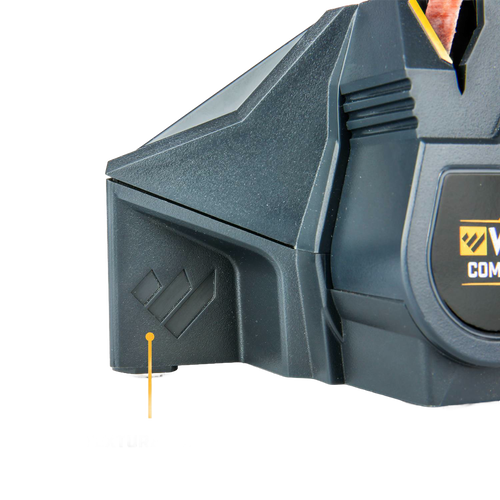 Close-up of compact powered knife sharpener corner featuring durable black plastic housing and part of flexible abrasive belt system for fast sharpening, ideal for farm, kitchen, and tool use.