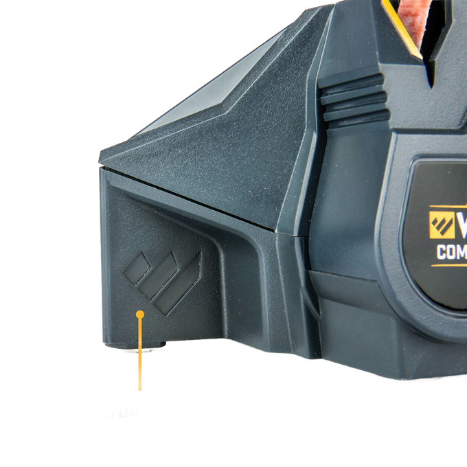 Close-up of compact powered knife sharpener corner featuring durable black plastic housing and part of flexible abrasive belt system for fast sharpening, ideal for farm, kitchen, and tool use.