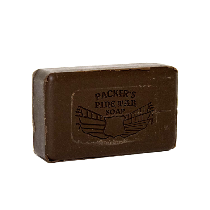 Single dark brown pine tar soap bar with embossed logo, crafted in the USA, featured in Health & Wellness, Grooming, Soaps, and USA Made collections.