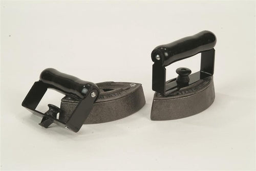 Pair of handcrafted cast iron clothes irons with black wooden handles, made in USA, designed for non-electric ironing, featured in Home & Decor and Laundry Supplies collections.