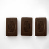 Three handcrafted brown pine tar soap bars, made in the USA, arranged side by side on a plain white background, featured in Health & Wellness and Grooming collections.