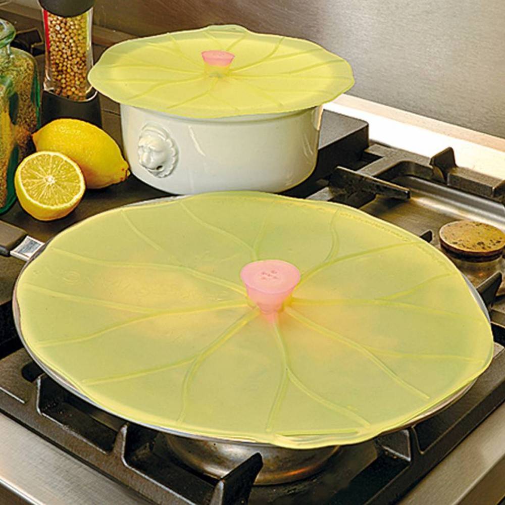 Flexible reusable silicone bowl covers resembling lilypad leaves with pink centers, creating airtight seals on cookware, ideal for Kitchen & Food, Kitchen Gadgets, Storage and Serving, and Best Sellers collections.