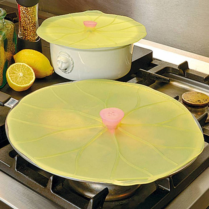 Flexible reusable silicone bowl covers resembling lilypad leaves with pink centers, creating airtight seals on cookware, ideal for Kitchen & Food, Kitchen Gadgets, Storage and Serving, and Best Sellers collections.