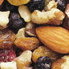 Close-up of a handcrafted protein-rich snack mix featuring roasted black walnuts, almonds, dried cherries, blueberries, golden raisins, and coconut flakes, made in the USA, perfect for Kitchen & Food and Snacks and Sweets collections.