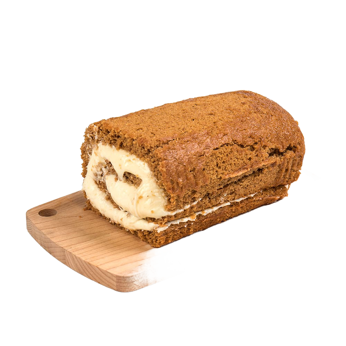 Moist pumpkin cake roll with rich cream cheese filling resting on a wooden board, handcrafted in USA, perfect for Kitchen & Food, Snacks and Sweets, and Best Sellers collections.