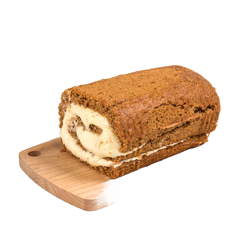 Moist pumpkin cake roll with rich cream cheese filling resting on a wooden board, handcrafted in USA, perfect for Kitchen & Food, Snacks and Sweets, and Best Sellers collections.