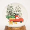 Handcrafted snow globe featuring a red truck with a Christmas tree and two dogs in snow, perfect for Home & Decor, Holiday Decor, and Best Sellers collections.