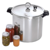 Large aluminum pressure canner with dial gauge and locking lid, shown with assorted glass jars of preserved foods, ideal for Kitchen & Food, Food Preservation, and Canning collections.