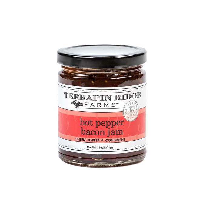 Glass jar of handcrafted Hot Pepper Bacon Jam with a black lid and red label, ideal for Kitchen & Food, Pantry, and USA Made collections at Lehman’s.