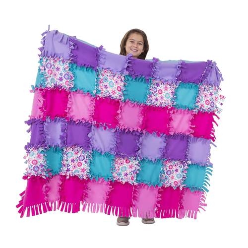 Child holding a large, handcrafted fleece quilt made of colorful purple, pink, teal, and floral patterned squares with tied fringe edges, promoting creativity in children's arts and crafts, toys, and best sellers collections.