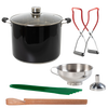 Handcrafted black water bath canner with glass lid paired with green silicone spatula, stainless steel funnel, wooden stirring paddle, and red-handled jar lifters for Kitchen & Food, Food Preservation, and Canning collections.