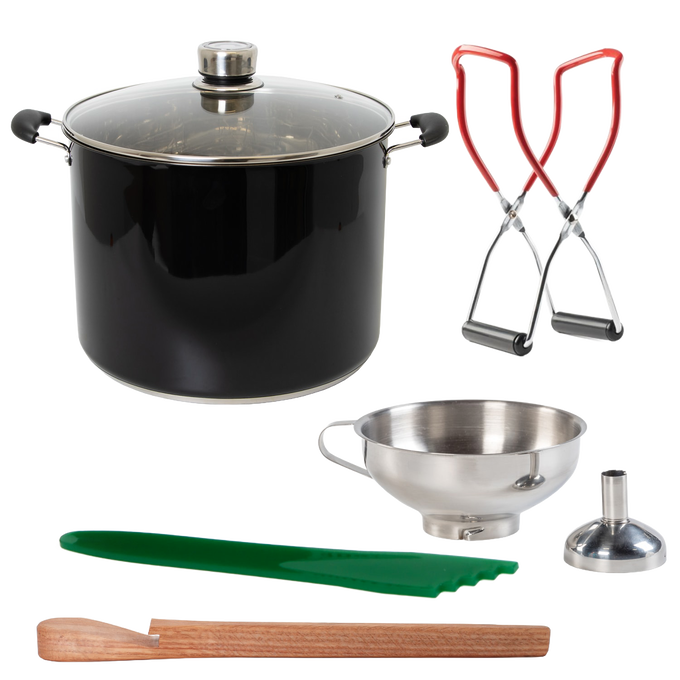 Handcrafted black water bath canner with glass lid paired with green silicone spatula, stainless steel funnel, wooden stirring paddle, and red-handled jar lifters for Kitchen & Food, Food Preservation, and Canning collections.
