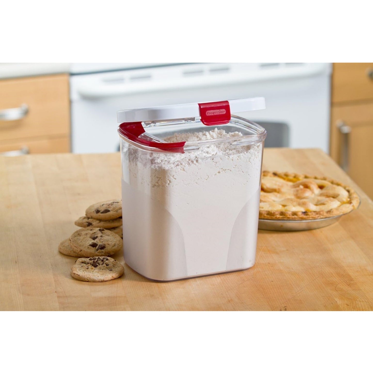 Clear plastic flour storage container with airtight white lid and red locking mechanism, designed to keep flour fresh and organized; featured in Kitchen & Food, Storage and Serving, Best Sellers, and Promo Eligible collections.
