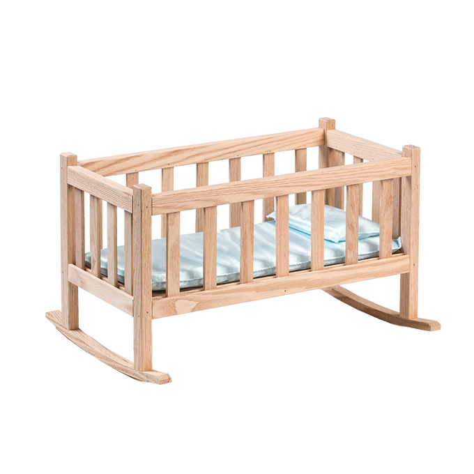 Handcrafted Amish made oak doll cradle with smooth finish and gentle rocking base, designed for indoor play and compatible with popular 18-inch dolls, featured in children's toys.