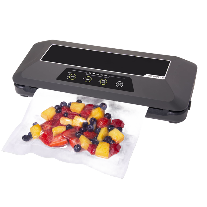 Sleek automatic electric vacuum sealer securing a clear bag filled with fresh mixed fruit, featured in Kitchen & Food, Food Preservation, Freezing, Best Sellers, and Promo Eligible collections.