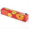 Reusable plastic wrap dispenser with a bright citrus design and built-in cutter, ideal for Kitchen & Food, Storage and Serving, Best Sellers, and Promo Eligible collections.