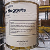 Close-up of a 24 oz can of freeze-dried chicken nuggets showing preparation instructions, displayed in a warehouse with metal shelving, featured in Kitchen & Food and Freeze Dried collections.