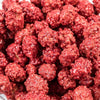 Close-up of crunchy candy-coated peanuts with a classic red coating, showcasing a handcrafted treat popular in USA Made, Candy, and Best Sellers collections.