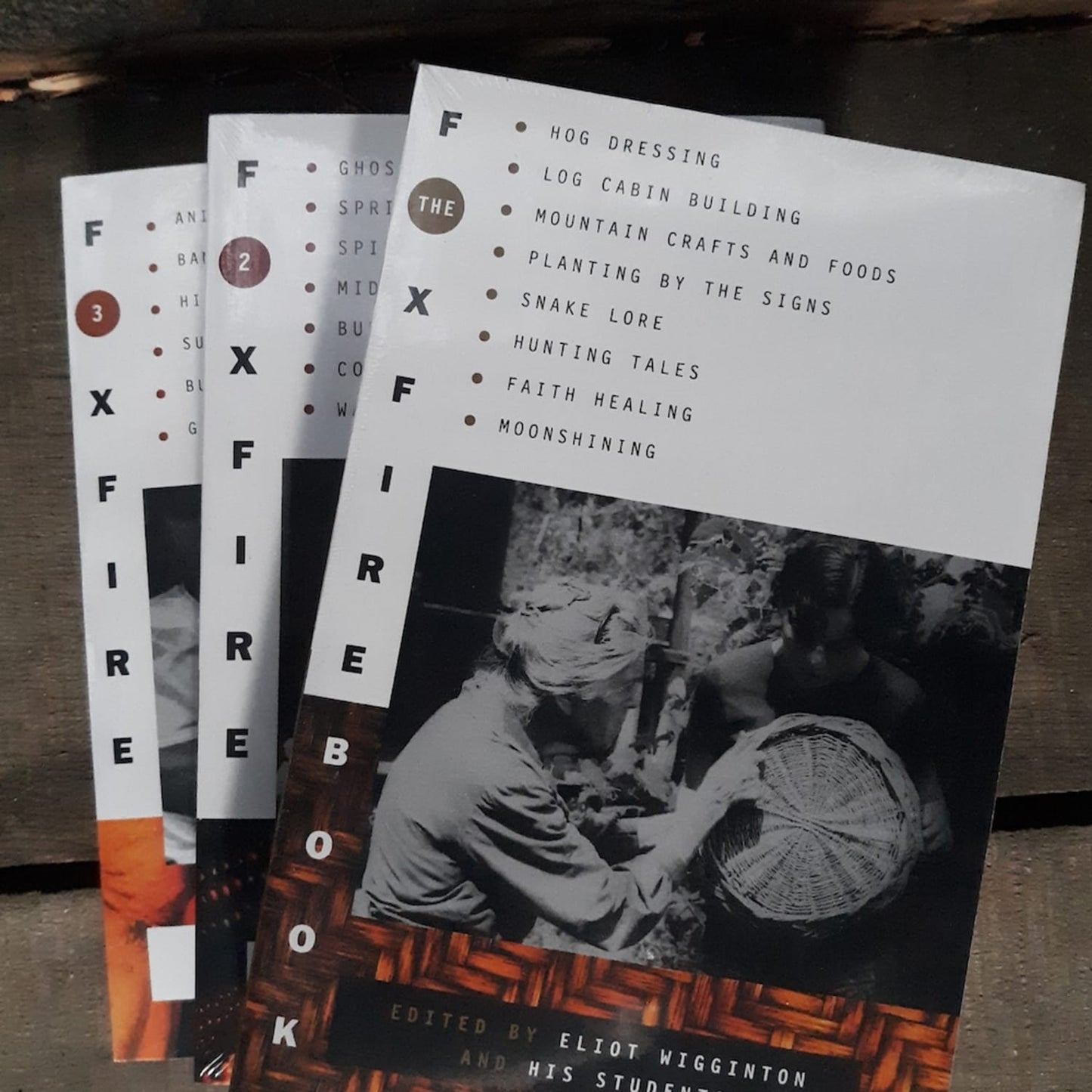 Set of heritage books featuring Appalachian traditions and skills including hog dressing, log cabin building, mountain crafts, hunting, and faith healing, ideal for books and lifestyle collections.