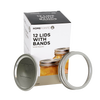 Box of 12 wide-mouth canning jar lids and bands with metal lids showing sealing compound and metal screw bands, suitable for food preservation in kitchen and canning collections.