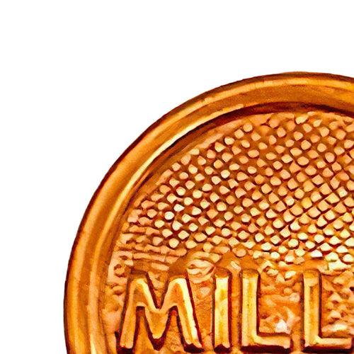 Close-up of a polished solid brass filler cap with embossed lettering and textured background, crafted for oil lamp parts in Lamps & Lighting and Accessories collections.