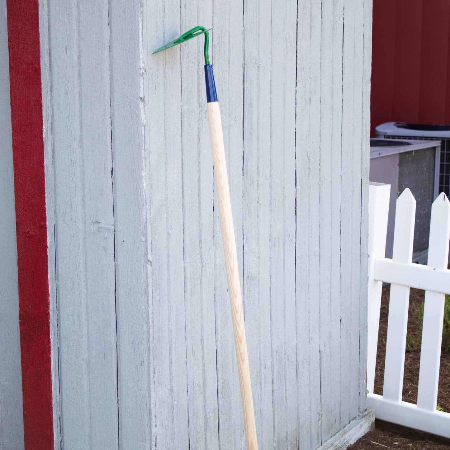 Handcrafted furrowing garden hoe with a lightweight 54-inch hickory handle and a sharp green high-carbon steel blade, made in USA and ideal for Farm, Garden & Tool and Digging and Cultivating collections.