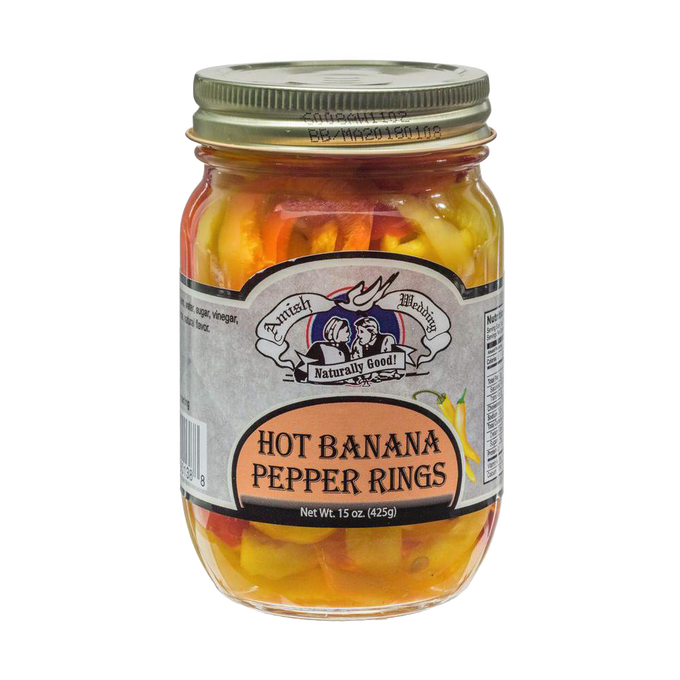 Jar of handcrafted hot banana pepper rings, made in USA, perfect for adding bold flavor to sandwiches, salads, and pizza, featured in Kitchen & Food and Pantry collections.