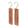 Two handcrafted red cedar hooks with natural wood grain and metal hangers, designed to repel moths and freshen closets, ideal for Health & Wellness and Home & Decor collections.