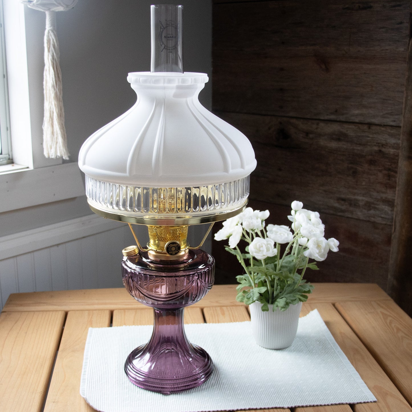 Handcrafted Aladdin Lincoln Drape oil lamp with amethyst glass base, polished brass burner, and white frosted top shade, bright enough for reading, perfect for Farm, Garden & Tool, Lamps & Lighting, Emergency Supplies, Oil Lamps, Table Lamps, Best Sellers, and Promo Eligible collections.