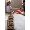 Reusable fabric bag containing a handcrafted wooden log playset with 73 pieces, made in the USA for imaginative indoor play, part of Toys, Books & Games and Wooden Toys collections.