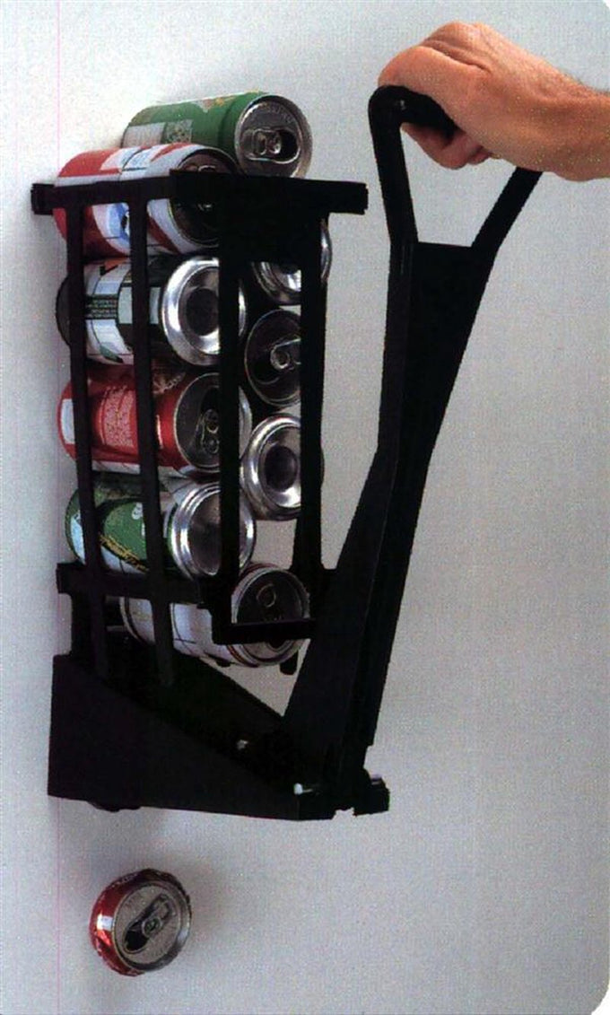 Hand pressing the lever of a sturdy black plastic can crusher mounted on a wall, holding a stack of aluminum soda cans, featured in Home & Decor, Household Helpers, USA Made, and Best Sellers collections.