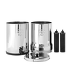 Polished stainless steel water filtration system with two chambers, removable lid, and two black filter elements, ideal for emergency supplies and water treatment appliances.