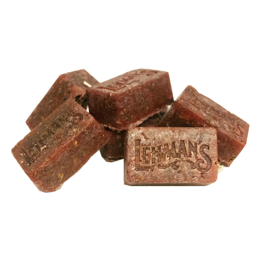 Cluster of handcrafted reddish-brown fire starters embossed with Lehman’s logo, made in the USA from natural reclaimed wax and sawdust, ideal for Farm, Garden & Tool, Stoves, Camping, and Hearth Accessories collections.
