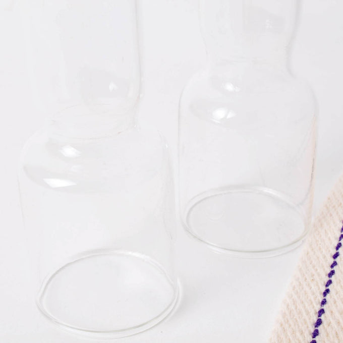 Two clear replacement oil lamp chimneys paired with two flat wicks, featured in Lamps & Lighting, Oil Lamps, Table Lamps, Best Sellers, and Promo Eligible collections.