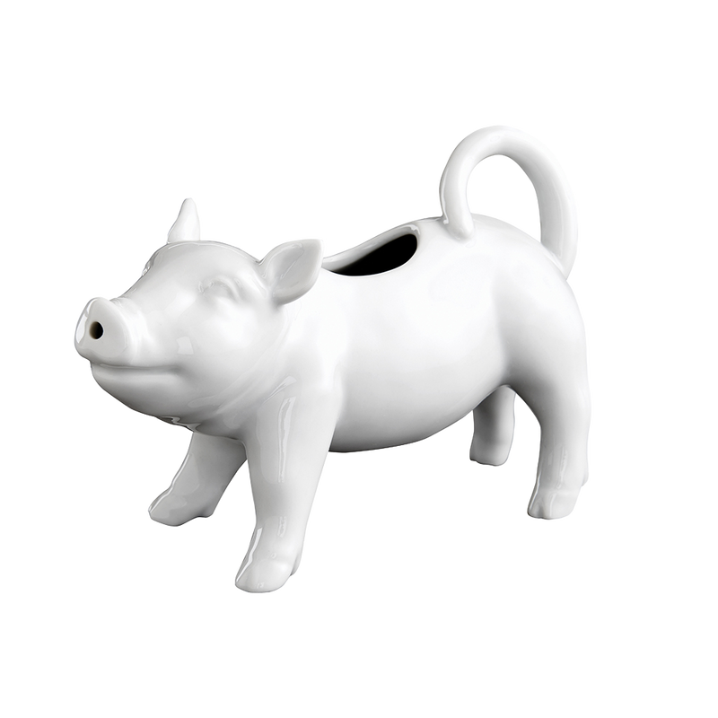 Glossy white porcelain creamer shaped like a playful pig with a drip-free spout, handcrafted for Kitchen & Food, Dinnerware, Storage and Serving, and Best Sellers collections.